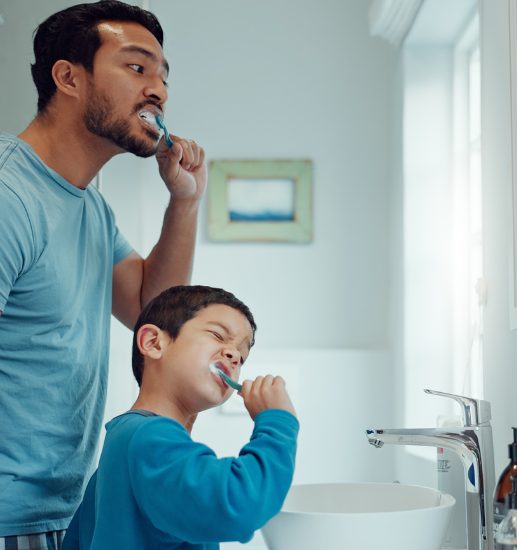 Leq Website Parent Resource father and son brushing teeth